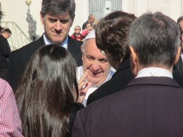 Pope Francis greets pilgrims at the Ash Wednesday audience.